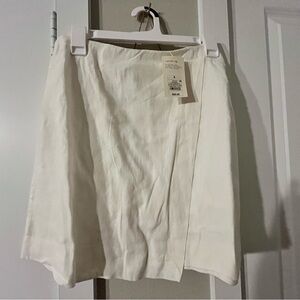 A New Day Cream Mini Skirt